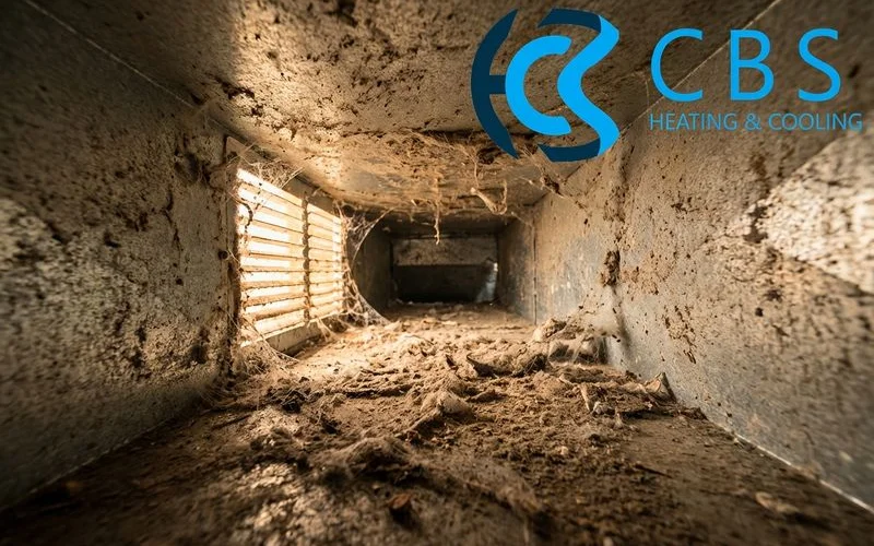 Inside view of dirty air duct filled with dust and debris before cleaning